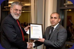 Joe Datt receiving his prize from the UEA Vice Chancellor Professor Bill MacMillan(photography by David Kirkham)