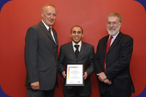 Joe Datt with Keith Nicholls (left) Director of the SportsPark and UEA Vice Chancellor Professor Bill MacMillan (photography by David Kirkham)