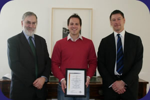 Ross Coomber receiving his Special Award from UEA Vice Chancellor Professor Bill MacMillan (left) and Peter Earl